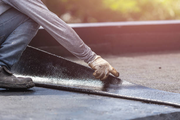 Professional Emergency Waterproofing technician working in Monroe, WI